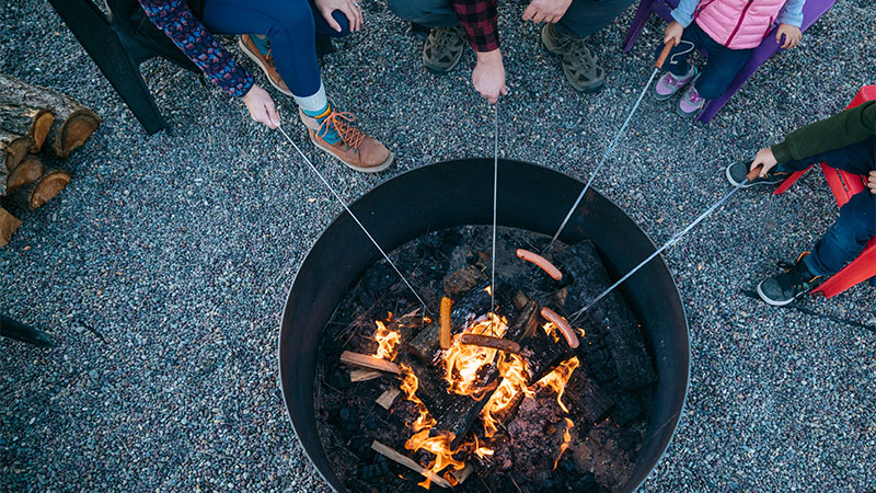 Outdoor photo family around fire pit